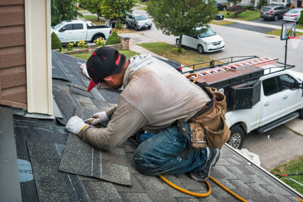Professional Roofing technician working in Enka, NC